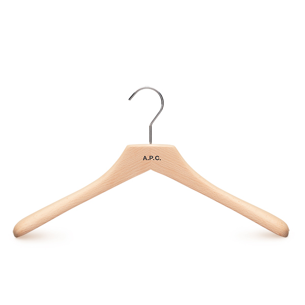 Wooden jacket hanger made from FSC beechwood with natural finish, chrome metal parts and printed logo for A.P.C.